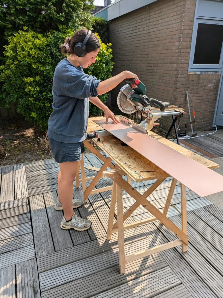 Sophia at the miter saw