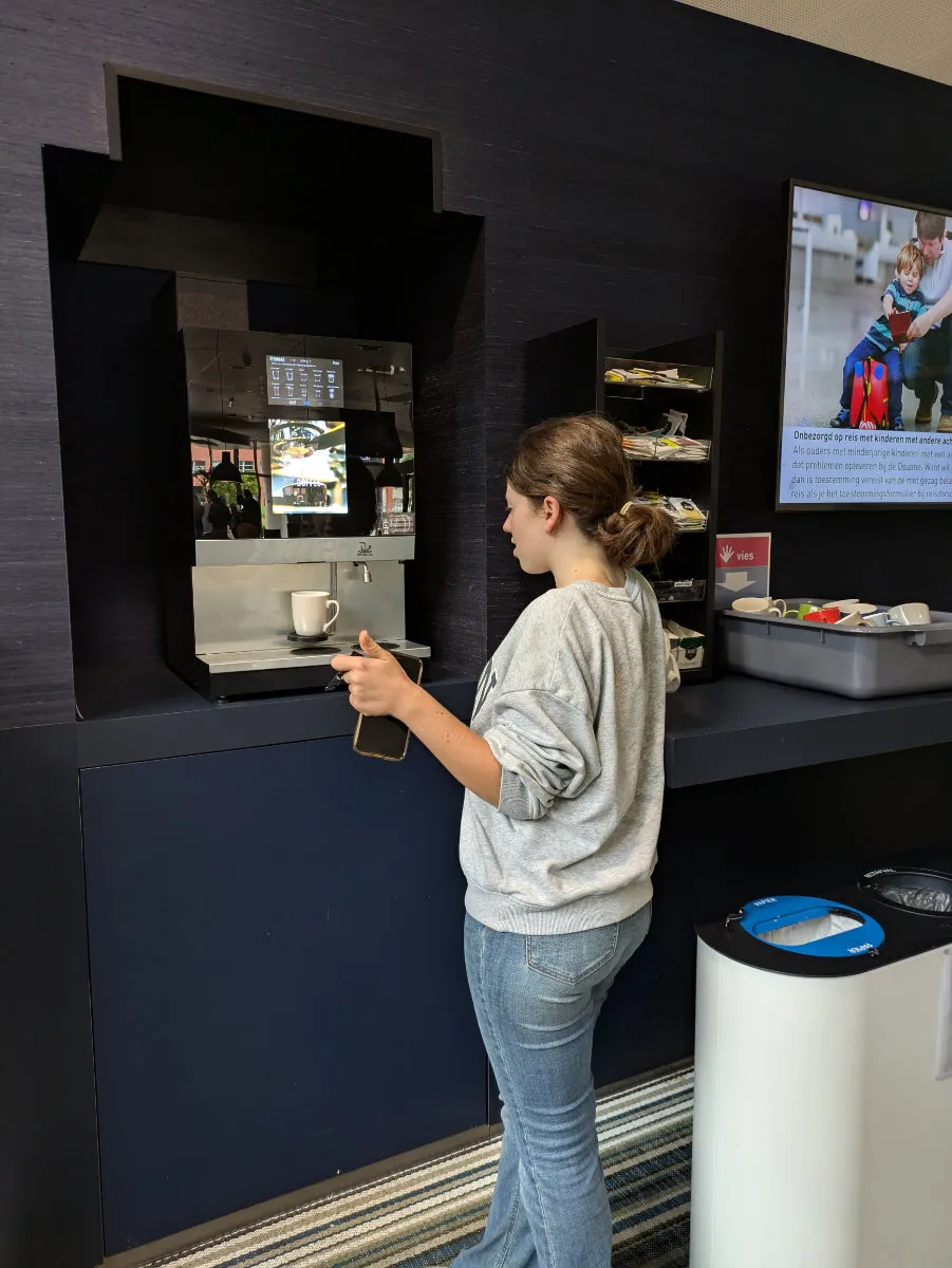 Gemma in front of the coffe machine